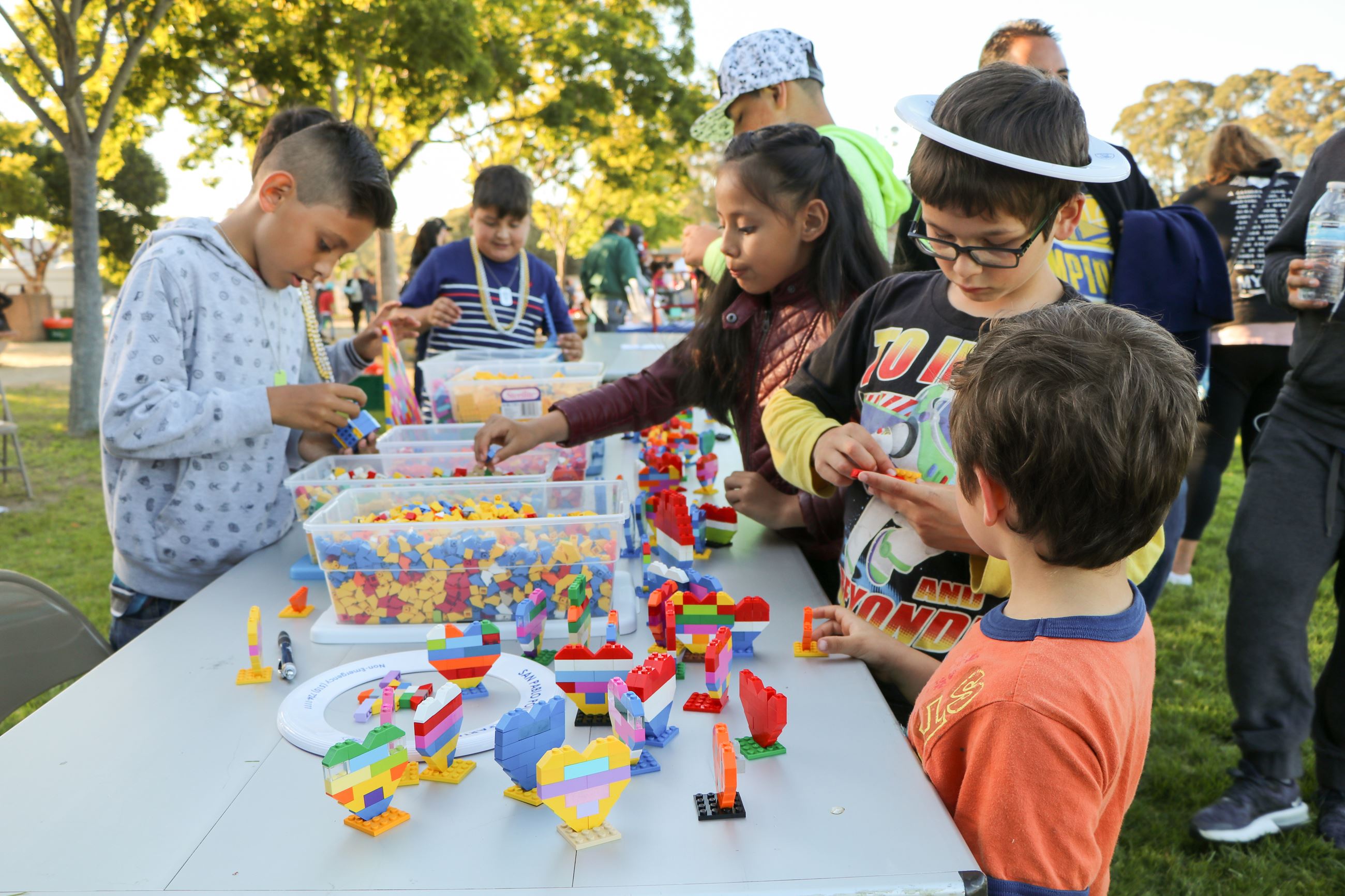 Children playing with Legos at 4th of July
