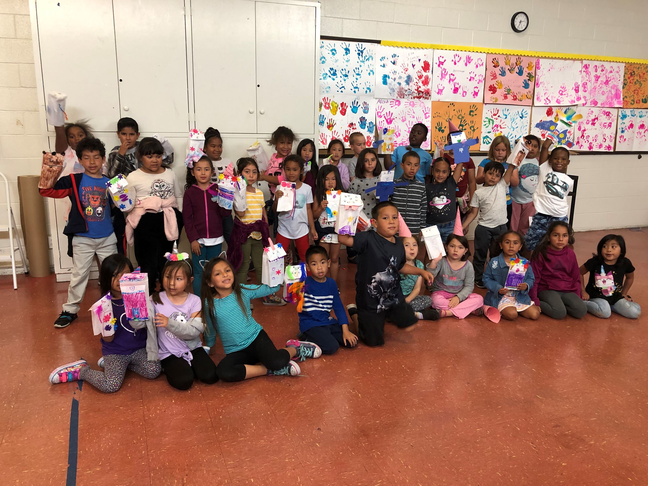 Jr. Campers showing their Paper Bag Craft