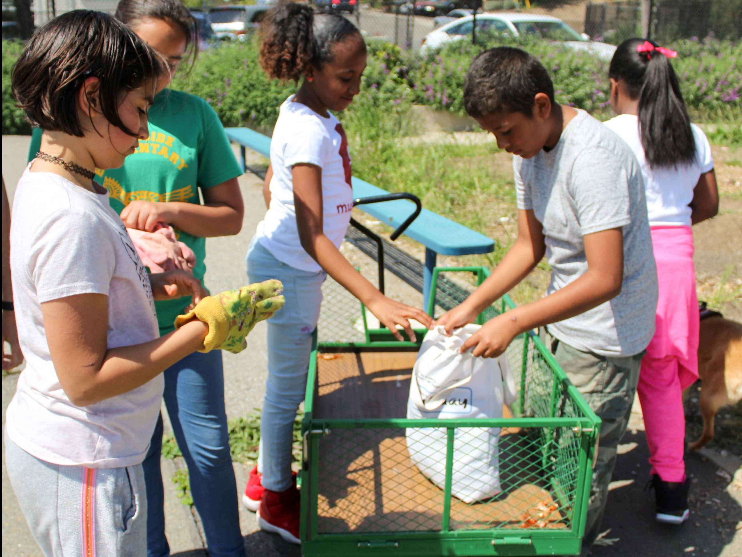 Students Participating in Gardening Group at Riverside Elementary 