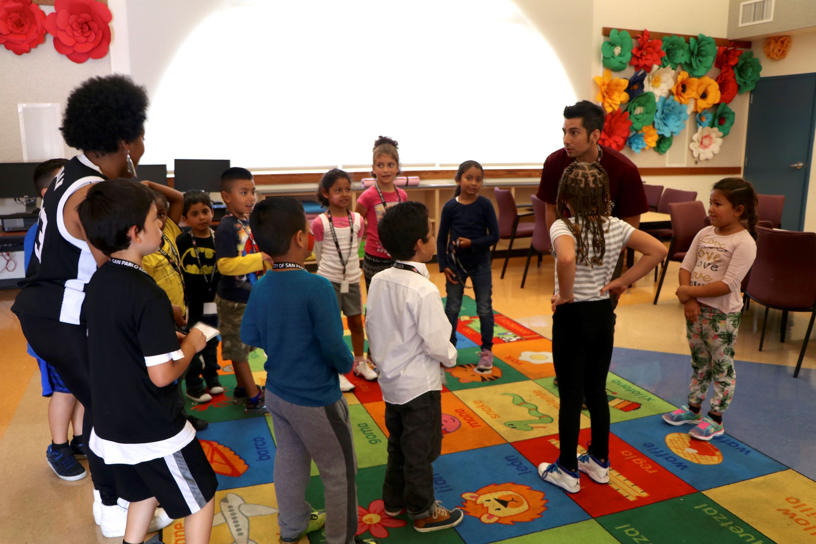Children Standing in a Circle at a Dover Elementary Classroom 
